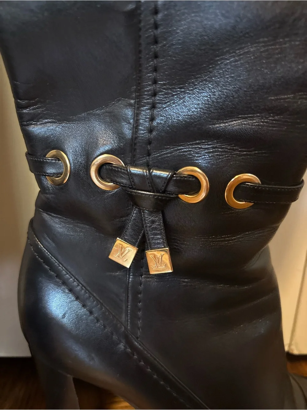 Louis Vuitton Black Leather Knee-High Heeled Boots with Gold Accents